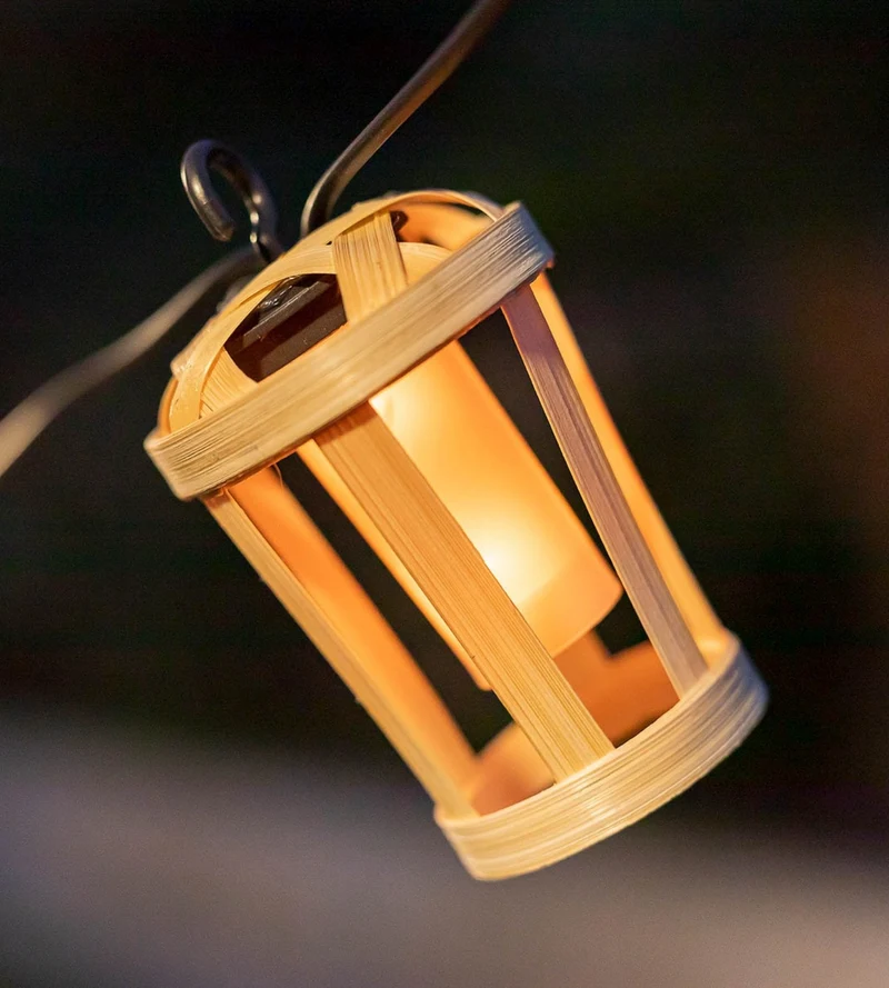 Guirlande lumineuse solaire HIAMA - Effet flamme - Design nature en bois - 10 lampes